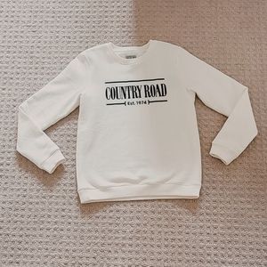 Country Road White Sweater With Blue Text